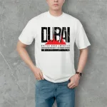 Áo thun nam Rurumen cổ tròn màu trắng in logo chữ DUBAI, size 4X