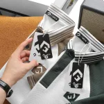 Áo thun polo nam phối màu với viền bo cổ bẻ, có size 3x