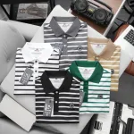 Shop sỉ áo Thun Polo Nam - Áo Thun Nam Phối Sọc Thêu Logo Trước Ngực Trẻ Trung Bigsize