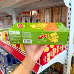 Bánh Kinh Đô AFC hạt thảo mộc vị bắp xào bơ 172g, quy cách 5 gói x 21,8g