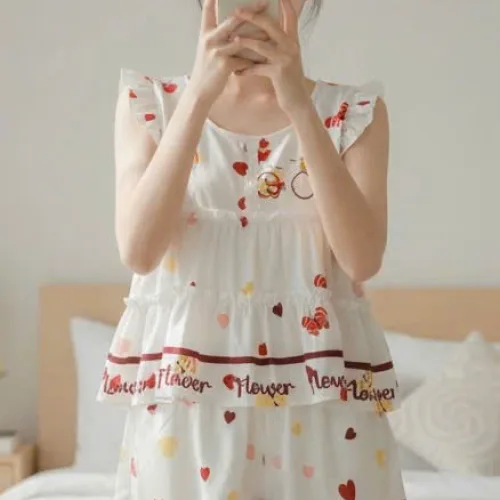 Đồ bộ nữ HT-95239 gồm áo tay cánh tiên và quần đùi chấm bi