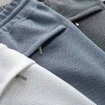 Nguồn hàng sỉ quần Short Nam - Quần Đùi Nam - Quần Nam Chất Liệu Vải Cá Sấu Karo Phối 2 Màu Trẻ Trung Năng Động (Size Từ M - XXL)