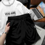 Quần short nam Pack Horse thun đen thêu chữ X