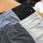 Quần Short Nam Vải Thun Thêu Chữ Boston