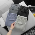 Nơi lấy sỉ quần Short Thun Nam Viền Sọc Ngang New Basic