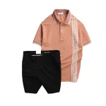 Bộ nam gồm áo polo cá sấu poly phối sọc và short kaki phối nút (có size 36)