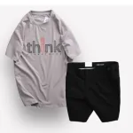 Bộ nam Big Size gồm áo thun cổ tròn in chữ và quần short kaki phối nút