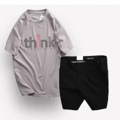 Bộ nam Big Size gồm áo thun cổ tròn in chữ và quần short kaki phối nút