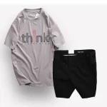 Bộ nam Big Size gồm áo thun cổ tròn in chữ và quần short kaki phối nút